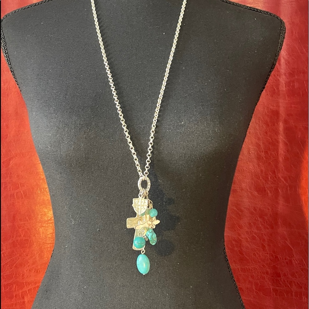 Silver and turquoise necklace with charms